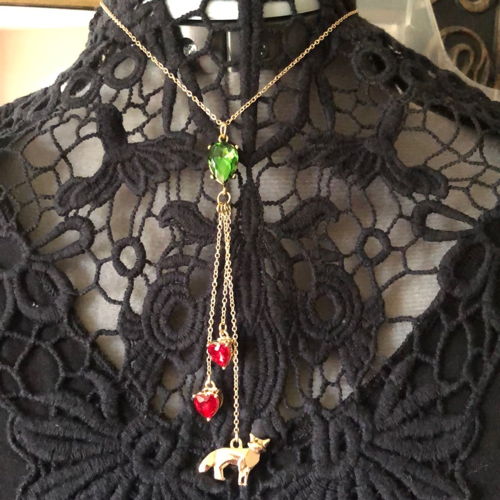 Gold‎ chain with the emerald and ruby Gemstones